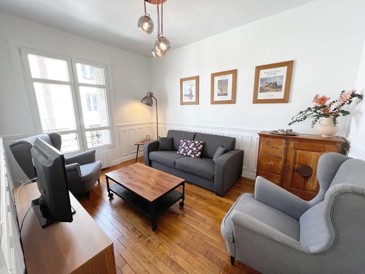Elegantly designed living room with modern furnishings in an apartment at Building Rue de Montreuil - hobe - 1564827 in 11th arrondissement, Paris Elegantly designed living room with modern furnishings in an apartment at Building Rue de Montreuil - hobe - 1564827 in 11th arrondissement, Paris