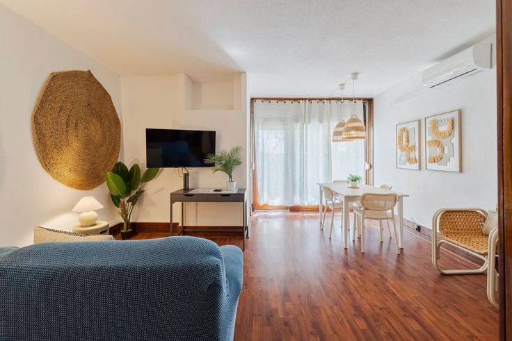 Elegantly designed living room with modern furnishings in an apartment at Building Rua da Azinheira - home-match - 1610669 in Carvalhal, Troia
