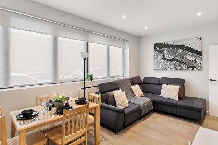 Elegantly designed living room with modern furnishings in an apartment at Building Arcadia Avenue - home-to-host-usa - 1466910 in London Borough of Barnet, London