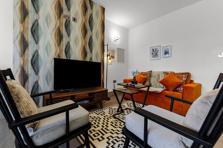 Salle de séjour élégante avec mobilier moderne dans un appartement à Building St Ivian Court, Colney Hatch Lane - home-to-host-usa - 1466632 à London Borough of Haringey, London Salle de séjour élégante avec mobilier moderne dans un appartement à Building St Ivian Court, Colney Hatch Lane - home-to-host-usa - 1466632 à London Borough of Haringey, London