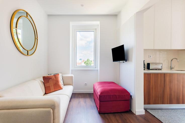 Sala de estar elegantemente projetada com móveis modernos em um apartamento no Building Rua Cidade de Cardiff 52A - homesbnbird - 1406915 em Penha de França, Lisbon Sala de estar elegantemente projetada com móveis modernos em um apartamento no Building Rua Cidade de Cardiff 52A - homesbnbird - 1406915 em Penha de França, Lisbon