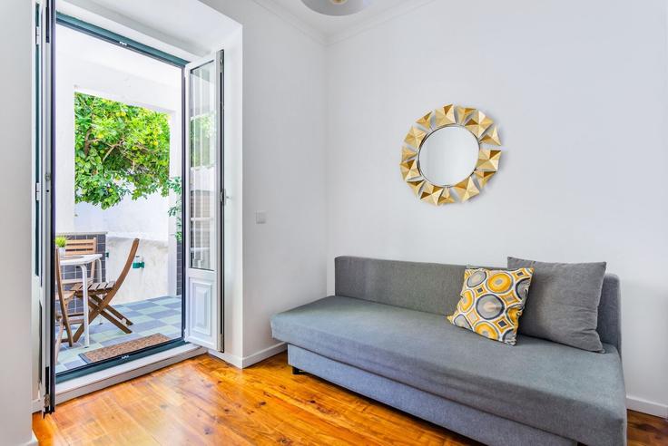 Elegantly designed living room with modern furnishings in an apartment at Building Rua das Olarias 68 - homesbnbird - 1422080 in São Vicente, Lisbon