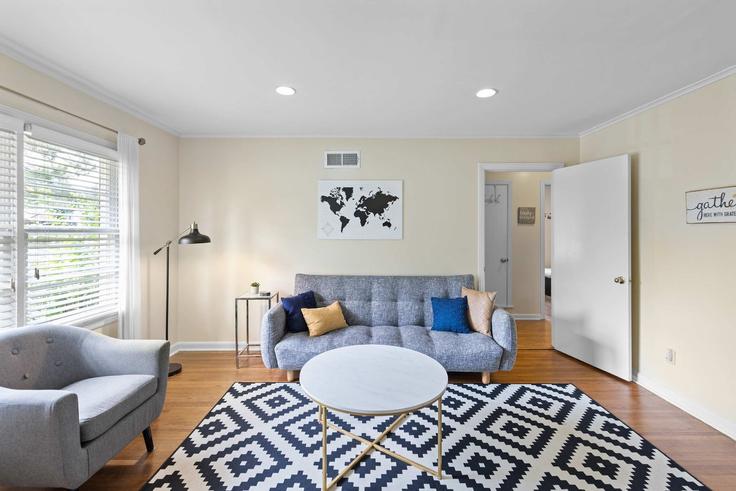 Memphis MemphisのBuilding Mount Moriah Road - hometeam - 1459264のアパートメントにある、モダンな家具を備えたエレガントなデザインのリビングルーム