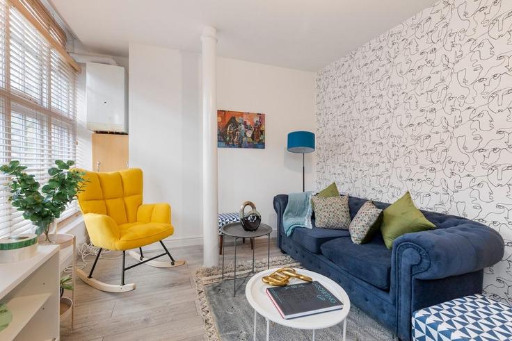 Elegantly designed living room with modern furnishings in an apartment at Building Rotherfield St - hometohost - 1056690 in London Borough of Islington, London