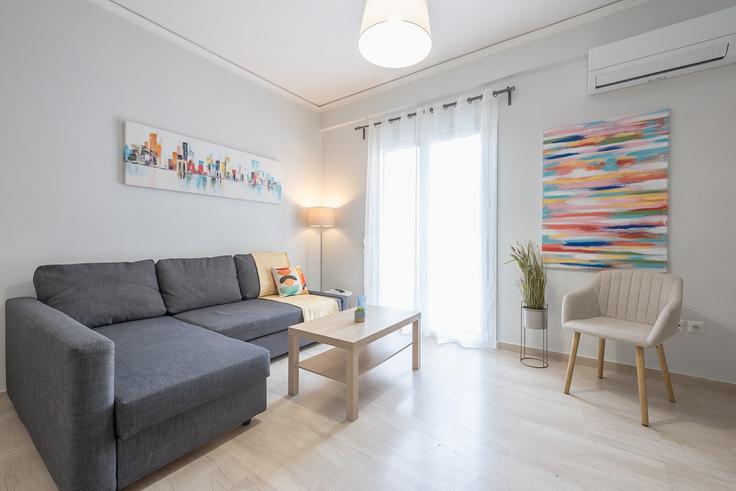 Elegant gestaltetes Wohnzimmer mit moderner Einrichtung in einer Wohnung im Building Karaiskaki - hopo - 1240149 - ATH in South Athens, Athens Elegant gestaltetes Wohnzimmer mit moderner Einrichtung in einer Wohnung im Building Karaiskaki - hopo - 1240149 - ATH in South Athens, Athens