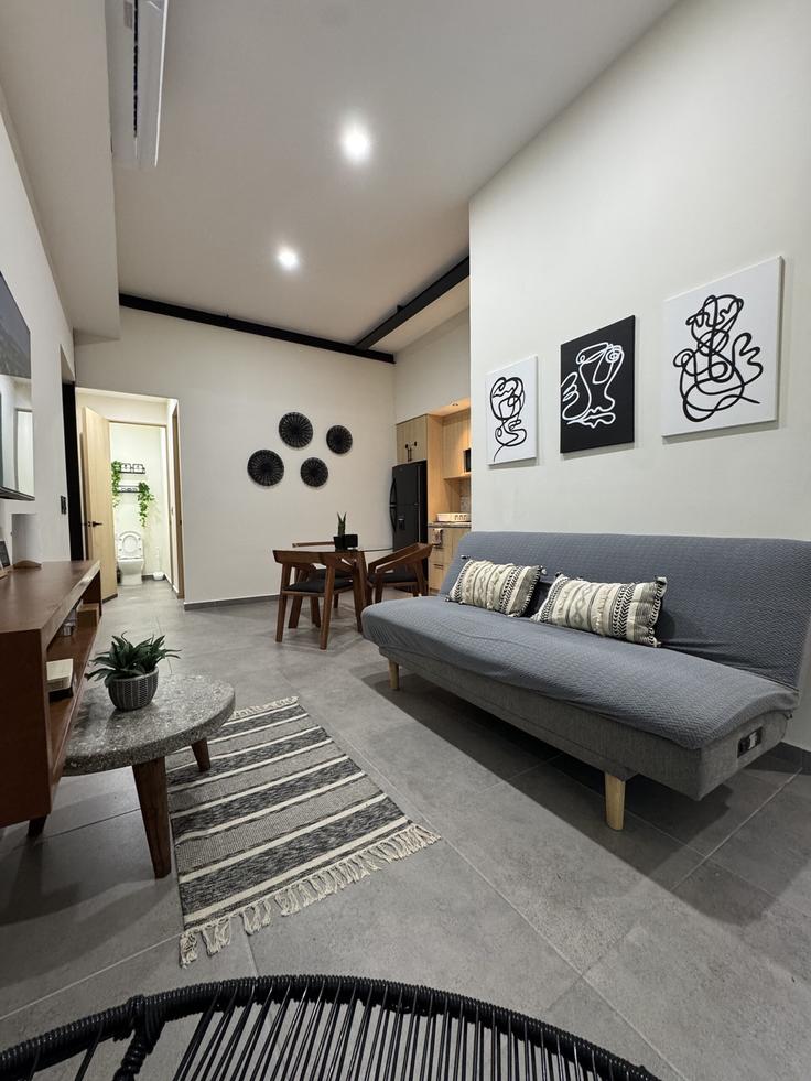 Sala de estar elegantemente projetada com móveis modernos em um apartamento no Building Av 10 norte - hosly - 1587266 em Playa del Carmen, Playa del Carmen Sala de estar elegantemente projetada com móveis modernos em um apartamento no Building Av 10 norte - hosly - 1587266 em Playa del Carmen, Playa del Carmen