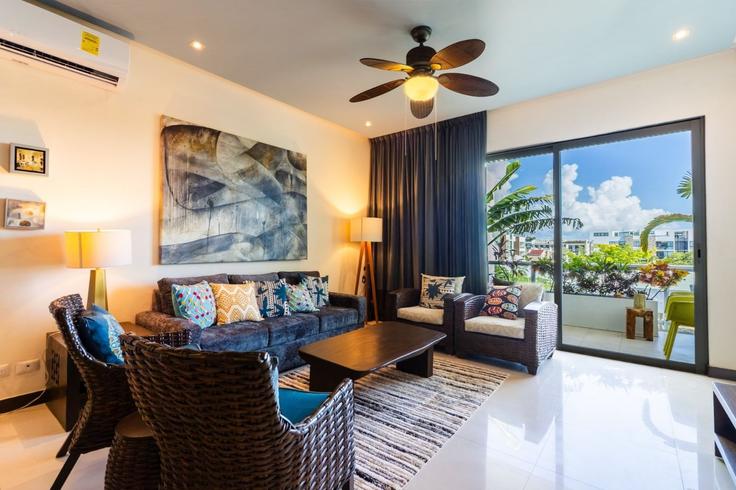 Sala de estar elegantemente projetada com móveis modernos em um apartamento no Building Calle 12 Norte - hosly - 1500049 em Playa del Carmen, Playa del Carmen Sala de estar elegantemente projetada com móveis modernos em um apartamento no Building Calle 12 Norte - hosly - 1500049 em Playa del Carmen, Playa del Carmen