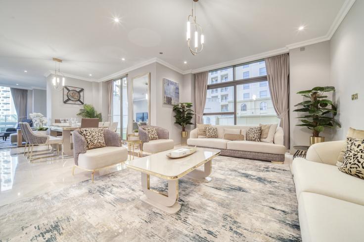 Sala de estar elegantemente projetada com móveis modernos em um apartamento no Building Al Gharbi Street - hospitality-expert-holiday-homes - 1335125 em Dubai Marina, Dubai Sala de estar elegantemente projetada com móveis modernos em um apartamento no Building Al Gharbi Street - hospitality-expert-holiday-homes - 1335125 em Dubai Marina, Dubai