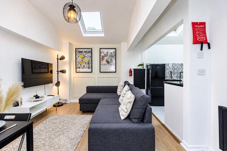 Elegant gestaltetes Wohnzimmer mit moderner Einrichtung in einer Wohnung im Building Thomas Street - host-a-home - 1647035 in Manchester, Manchester Elegant gestaltetes Wohnzimmer mit moderner Einrichtung in einer Wohnung im Building Thomas Street - host-a-home - 1647035 in Manchester, Manchester