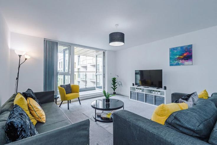 Elegante sala de estar con mobiliario moderno en un apartamento en Building Adelphi Street - host-a-home - 1294178 en City of Salford, Salford Elegante sala de estar con mobiliario moderno en un apartamento en Building Adelphi Street - host-a-home - 1294178 en City of Salford, Salford