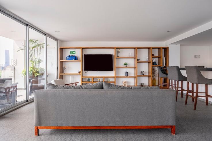 Elegante sala de estar con mobiliario moderno en un apartamento en Building Iztaccihuatl - hostair - 1582661 en Mexico City, Mexico City Elegante sala de estar con mobiliario moderno en un apartamento en Building Iztaccihuatl - hostair - 1582661 en Mexico City, Mexico City