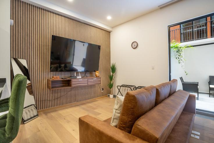 Elegant gestaltetes Wohnzimmer mit moderner Einrichtung in einer Wohnung im Building Calle Doctor García Diego - hostair - 1582443 in Mexico City, Mexico City Elegant gestaltetes Wohnzimmer mit moderner Einrichtung in einer Wohnung im Building Calle Doctor García Diego - hostair - 1582443 in Mexico City, Mexico City