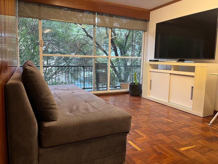 Elegante sala de estar con mobiliario moderno en un apartamento en Building Insurgentes Norte - hostair - 1582516 en Mexico City, Mexico City Elegante sala de estar con mobiliario moderno en un apartamento en Building Insurgentes Norte - hostair - 1582516 en Mexico City, Mexico City