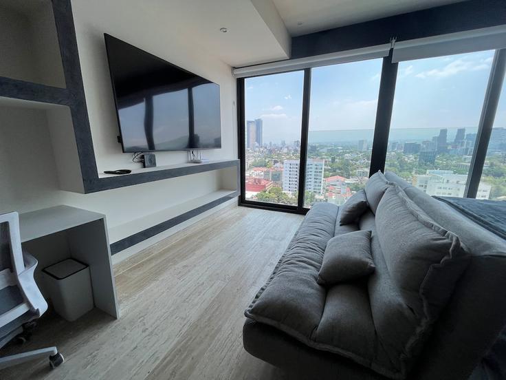 Elegant gestaltetes Wohnzimmer mit moderner Einrichtung in einer Wohnung im Building Lago de Patzcuaro - hostair - 1582572 in Mexico City, Mexico City Elegant gestaltetes Wohnzimmer mit moderner Einrichtung in einer Wohnung im Building Lago de Patzcuaro - hostair - 1582572 in Mexico City, Mexico City