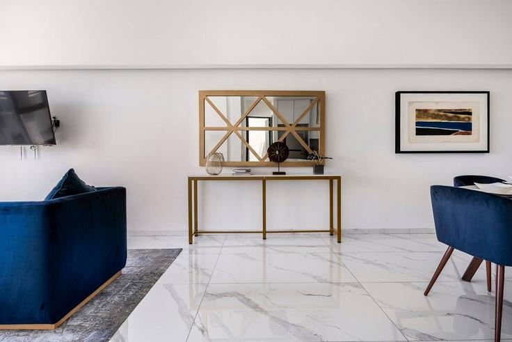 Elegante sala de estar con mobiliario moderno en un apartamento en Building Chicontepec - hostair - 1582580 en Mexico City, Mexico City Elegante sala de estar con mobiliario moderno en un apartamento en Building Chicontepec - hostair - 1582580 en Mexico City, Mexico City