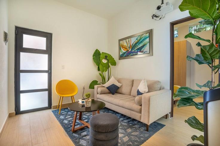 Sala de estar elegantemente projetada com móveis modernos em um apartamento no Building Campeche - hostair - 1582553 em Mexico City, Mexico City Sala de estar elegantemente projetada com móveis modernos em um apartamento no Building Campeche - hostair - 1582553 em Mexico City, Mexico City