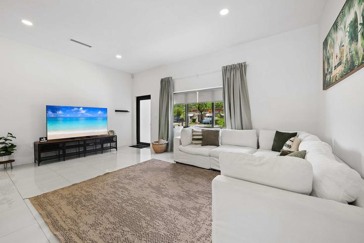Elegantly designed living room with modern furnishings in an apartment at Building Southwest 13th Terrace - hostandkeep - 1623206 in Miami, Miami Elegantly designed living room with modern furnishings in an apartment at Building Southwest 13th Terrace - hostandkeep - 1623206 in Miami, Miami
