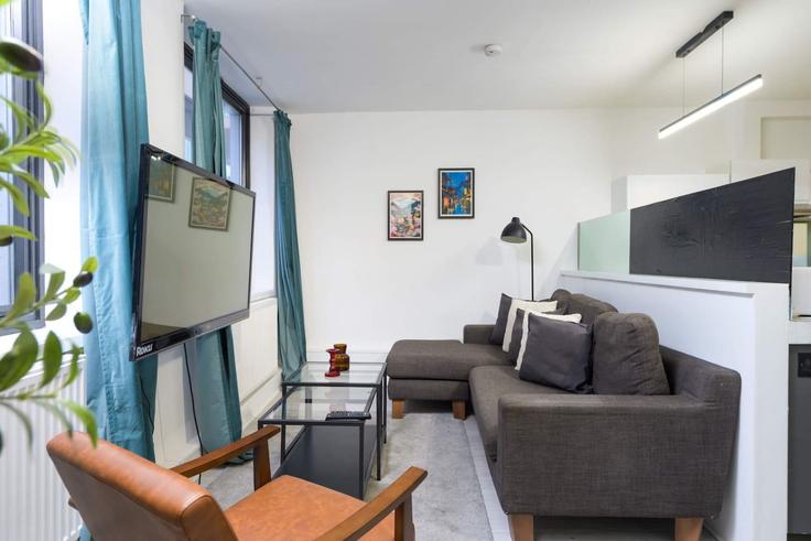 Elegante sala de estar con mobiliario moderno en un apartamento en Building Pear Tree Street - hostara-homes - 1588400 en London Borough of Islington, London Elegante sala de estar con mobiliario moderno en un apartamento en Building Pear Tree Street - hostara-homes - 1588400 en London Borough of Islington, London