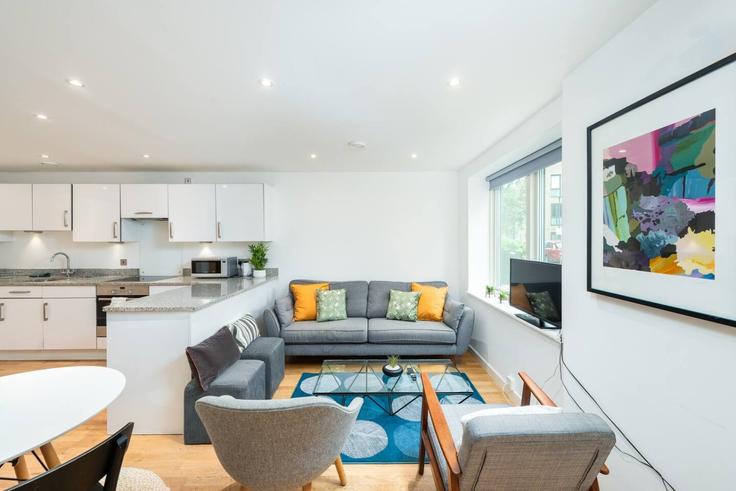 Salle de séjour élégante avec mobilier moderne dans un appartement à Building Godfrey Place - hostara-homes - 1588411 à London Borough of Tower Hamlets, London