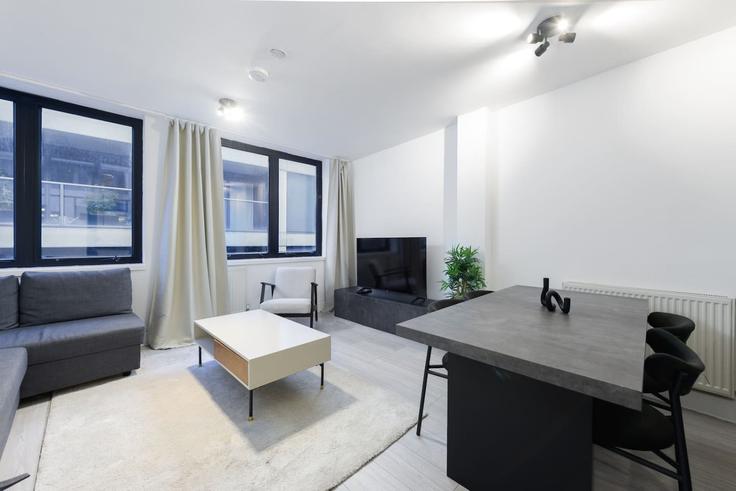 Elegante sala de estar con mobiliario moderno en un apartamento en Building Pear Tree Street - hostara-homes - 1588414 en London Borough of Islington, London Elegante sala de estar con mobiliario moderno en un apartamento en Building Pear Tree Street - hostara-homes - 1588414 en London Borough of Islington, London