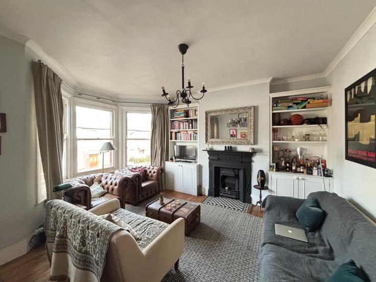 Elegantly designed living room with modern furnishings in an apartment at Building Carlingford Road - hostedbysleepover - 1464869 in London Borough of Haringey, London