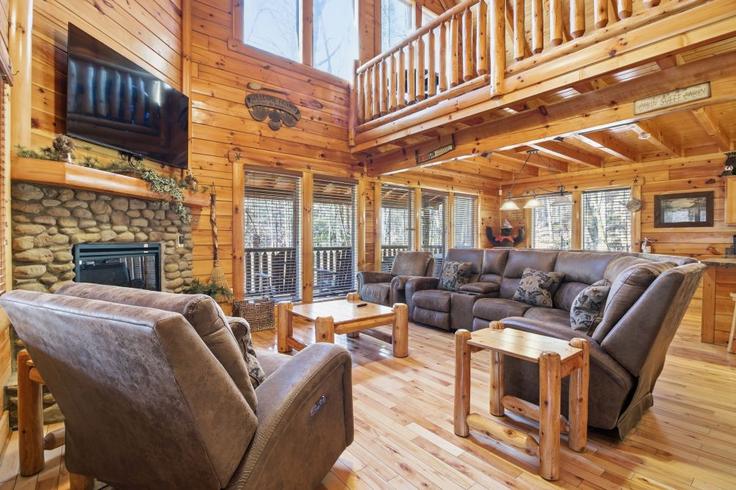 Sala de estar elegantemente projetada com móveis modernos em um apartamento no Building Bogle Spring Loop - hosteeva - 1466156 em Sevierville, Sevierville