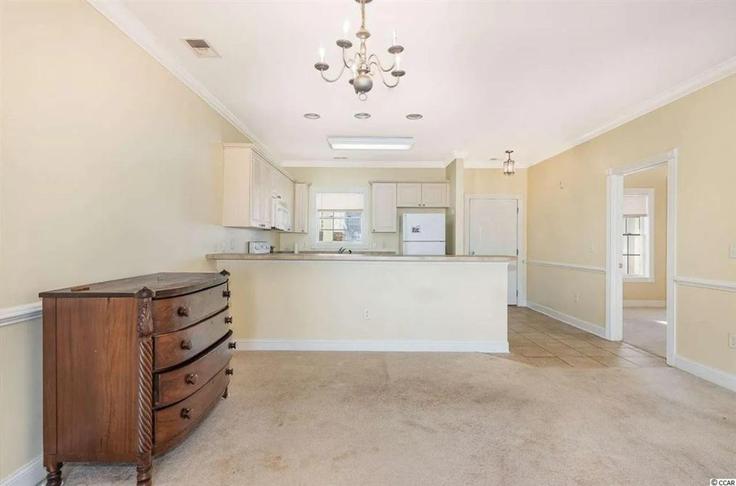 Sala de estar elegantemente projetada com móveis modernos em um apartamento no Building Luster Leaf Circle - hosteeva - 1355268 em Myrtle Beach, Myrtle Beach Sala de estar elegantemente projetada com móveis modernos em um apartamento no Building Luster Leaf Circle - hosteeva - 1355268 em Myrtle Beach, Myrtle Beach