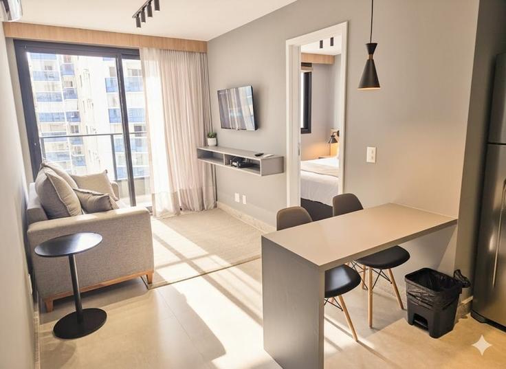 Salle de séjour élégante avec mobilier moderne dans un appartement à Building Rua Dukla de Aguiar - housi-servicos-digitais-sa - 1604676 à Santa Helena, Vitória