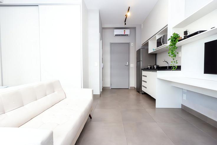 Elegant gestaltetes Wohnzimmer mit moderner Einrichtung in einer Wohnung im Building Rua Oscar Freire - housi-servicos-digitais-sa - 1605401 in Pinheiros, São Paulo