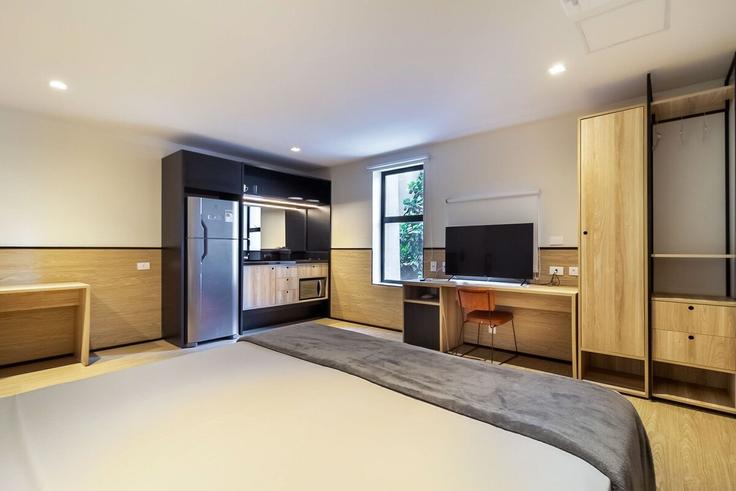Elegante sala de estar con mobiliario moderno en un apartamento en Building Rua Bela Cintra - housi-servicos-digitais-sa - 1604291 en Cerqueira César, São Paulo Elegante sala de estar con mobiliario moderno en un apartamento en Building Rua Bela Cintra - housi-servicos-digitais-sa - 1604291 en Cerqueira César, São Paulo