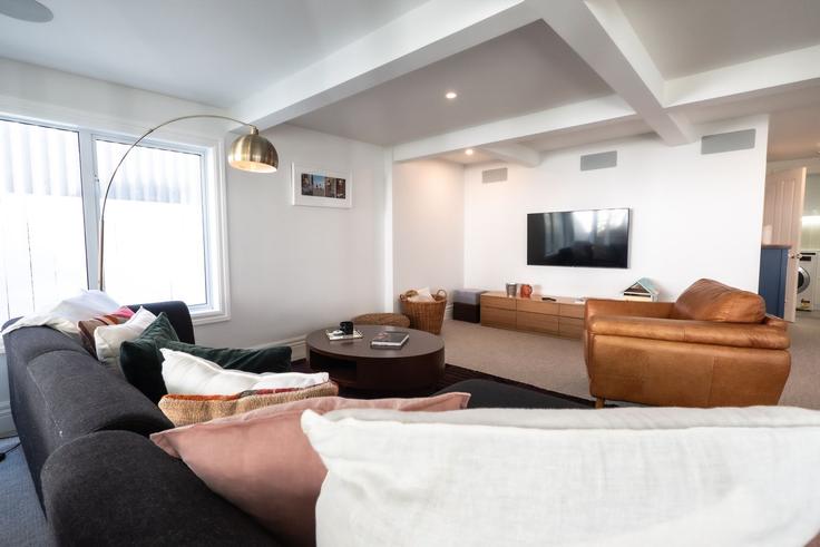 Salle de séjour élégante avec mobilier moderne dans un appartement à Building 30 Summer Street - houst - 1244205 - NZL à Ponsonby, Auckland