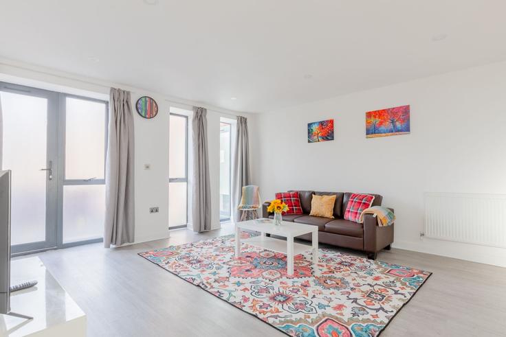Salle de séjour élégante avec mobilier moderne dans un appartement à Building Watford Road - houst - 1244008 - LON à London Borough of Newham, London