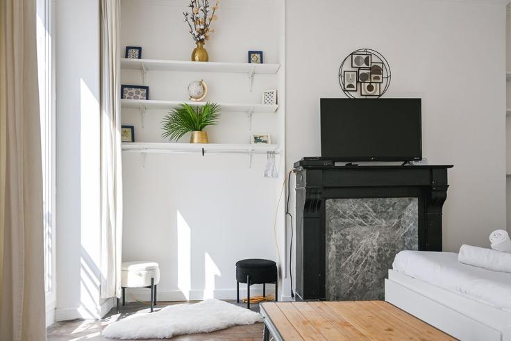 Elegantly designed living room with modern furnishings in an apartment at Building Rue Amelot - houst - 1244190 - PAR in 11th arrondissement, Paris