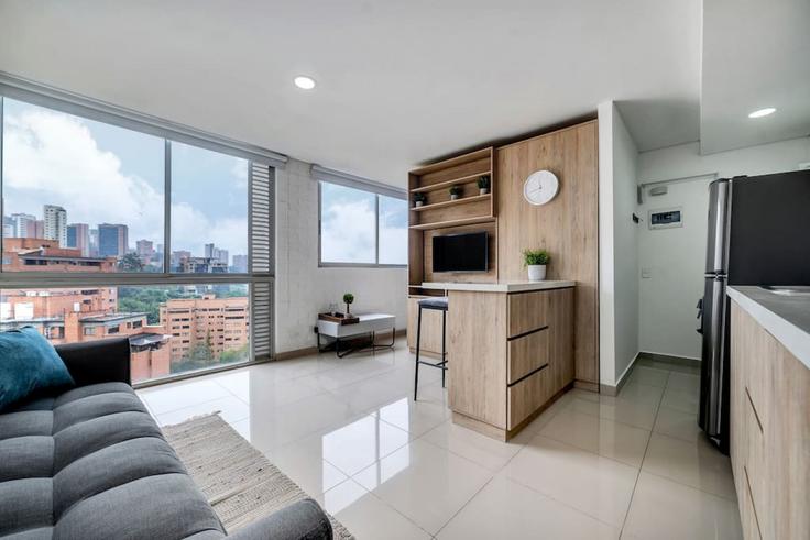 Building Carrera 29 - housy-host - 1326941 adresindeki bir dairede modern mobilyalarla zarif bir şekilde tasarlanmış oturma odası El Poblado, Medellín Building Carrera 29 - housy-host - 1326941 adresindeki bir dairede modern mobilyalarla zarif bir şekilde tasarlanmış oturma odası El Poblado, Medellín