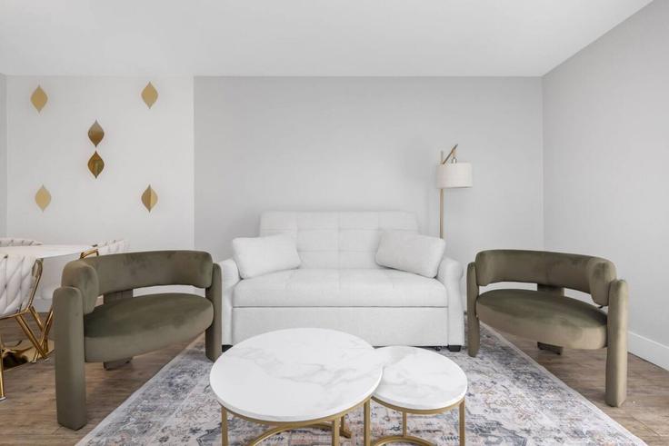 Elegantly designed living room with modern furnishings in an apartment at Building West Kennedy Boulevard - ic-property-holdings-llc - 1365974 in Tampa, Tampa Elegantly designed living room with modern furnishings in an apartment at Building West Kennedy Boulevard - ic-property-holdings-llc - 1365974 in Tampa, Tampa
