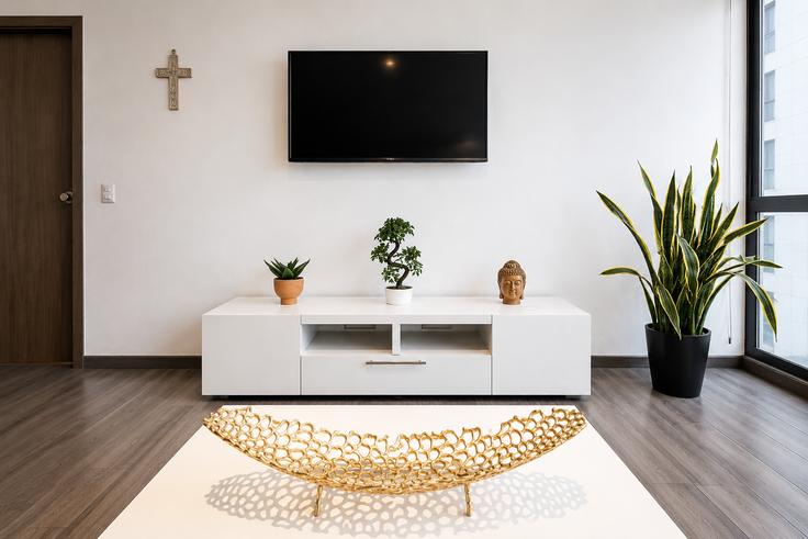 Elegantly designed living room with modern furnishings in an apartment at Building Lago Iseo - ihaus-properties - 1282173 - MEX in Mexico City, Mexico City