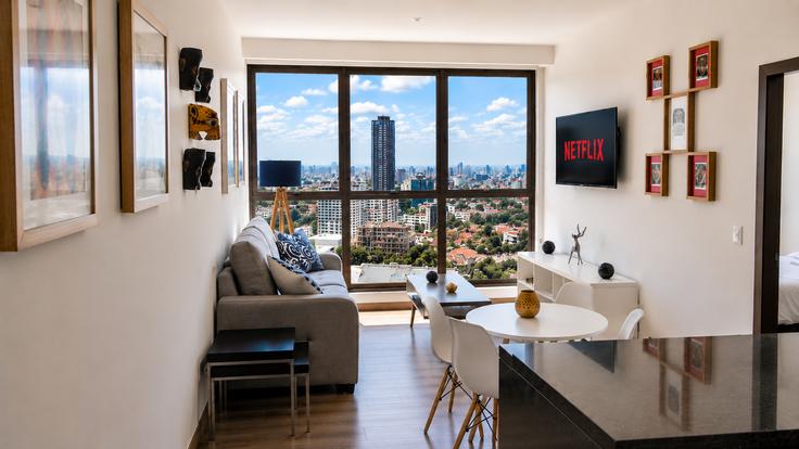Elegantly designed living room with modern furnishings in an apartment at Building Lago Alberto - ihaus-properties - 1282167 - MEX in Mexico City, Mexico City