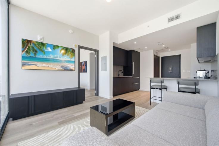 Building Northeast 11th Street - ilios-rentals - 1621178 adresindeki bir dairede modern mobilyalarla zarif bir şekilde tasarlanmış oturma odası Miami, Miami Building Northeast 11th Street - ilios-rentals - 1621178 adresindeki bir dairede modern mobilyalarla zarif bir şekilde tasarlanmış oturma odası Miami, Miami