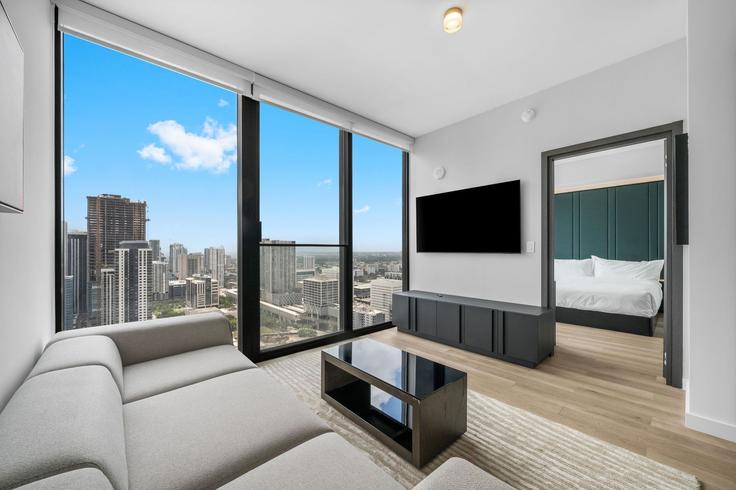 Elegant gestaltetes Wohnzimmer mit moderner Einrichtung in einer Wohnung im Building Northeast 11th Street - ilios-rentals - 1592932 in Miami, Miami Elegant gestaltetes Wohnzimmer mit moderner Einrichtung in einer Wohnung im Building Northeast 11th Street - ilios-rentals - 1592932 in Miami, Miami