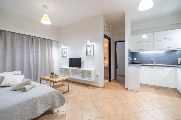 Elegant gestaltetes Wohnzimmer mit moderner Einrichtung in einer Wohnung im Building Greece - imberal - 1459568 in Areopoli, Laconia