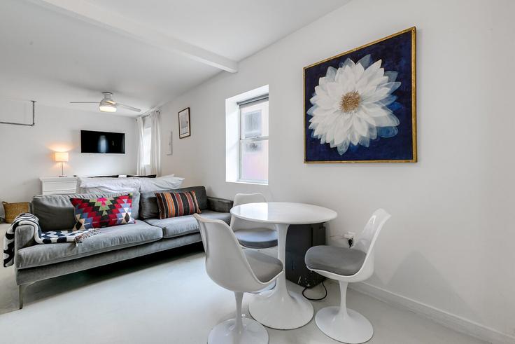 Elegantly designed living room with modern furnishings in an apartment at Building Northeast 46th Street - in-paradise-rentals-llc - 1569609 in Miami, Miami Elegantly designed living room with modern furnishings in an apartment at Building Northeast 46th Street - in-paradise-rentals-llc - 1569609 in Miami, Miami