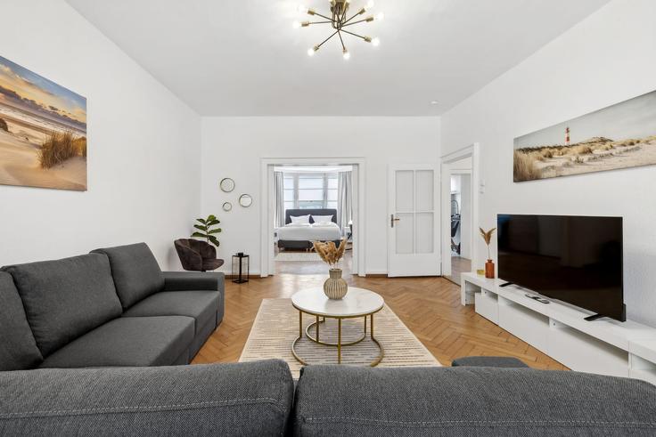 Elegante sala de estar con mobiliario moderno en un apartamento en Building Bismarckstraße - infinity-stay - 1323863 en Wilhelmshaven, Wilhelmshaven Elegante sala de estar con mobiliario moderno en un apartamento en Building Bismarckstraße - infinity-stay - 1323863 en Wilhelmshaven, Wilhelmshaven