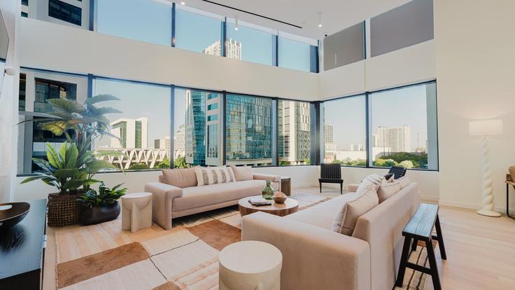 Elegante sala de estar con mobiliario moderno en un apartamento en Building Northwest 3rd Street - ionica - 1523910 en Miami, Miami Elegante sala de estar con mobiliario moderno en un apartamento en Building Northwest 3rd Street - ionica - 1523910 en Miami, Miami