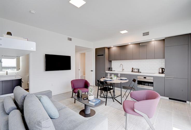 Elegantly designed living room with modern furnishings in an apartment at Building Northeast 3rd Street - ionica - 1058669 - MIA in Miami, Miami