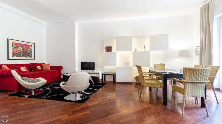 Sala de estar elegantemente projetada com móveis modernos em um apartamento no Building Piazzale Antonio Cantore - italianway-spa - 1538135 em Milan, Milan Sala de estar elegantemente projetada com móveis modernos em um apartamento no Building Piazzale Antonio Cantore - italianway-spa - 1538135 em Milan, Milan