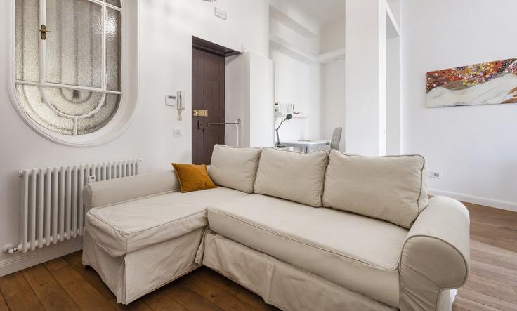 Elegante sala de estar con mobiliario moderno en un apartamento en Building Via Gaspare Rosales - italianway-spa - 1538240 en Milan, Milan Elegante sala de estar con mobiliario moderno en un apartamento en Building Via Gaspare Rosales - italianway-spa - 1538240 en Milan, Milan