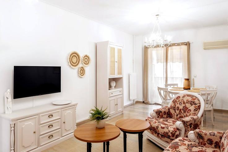 Elegantly designed living room with modern furnishings in an apartment at Building Friderikou Smith - ivy-vacation-rentals - 1503042 in Central Athens, Athens