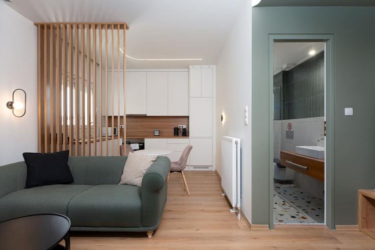 Salle de séjour élégante avec mobilier moderne dans un appartement à Building Achilleos - ivy-vacation-rentals - 1503043 à Central Athens, Athens