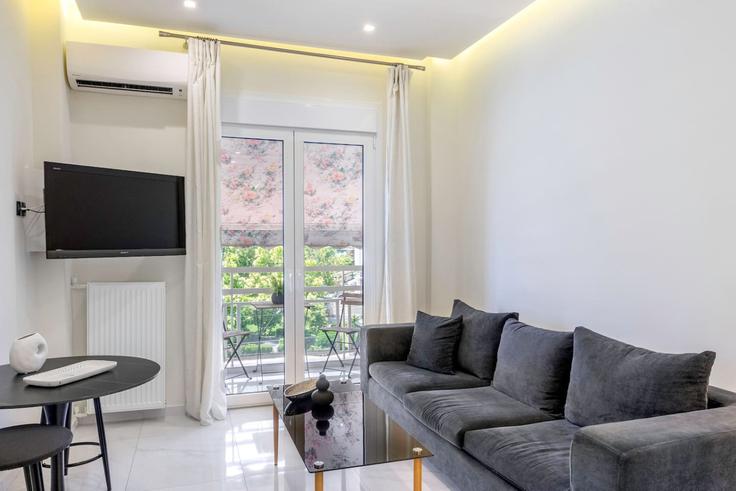 Building Kallirrois - ivy-vacation-rentals - 1503049 adresindeki bir dairede modern mobilyalarla zarif bir şekilde tasarlanmış oturma odası Central Athens, Athens Building Kallirrois - ivy-vacation-rentals - 1503049 adresindeki bir dairede modern mobilyalarla zarif bir şekilde tasarlanmış oturma odası Central Athens, Athens