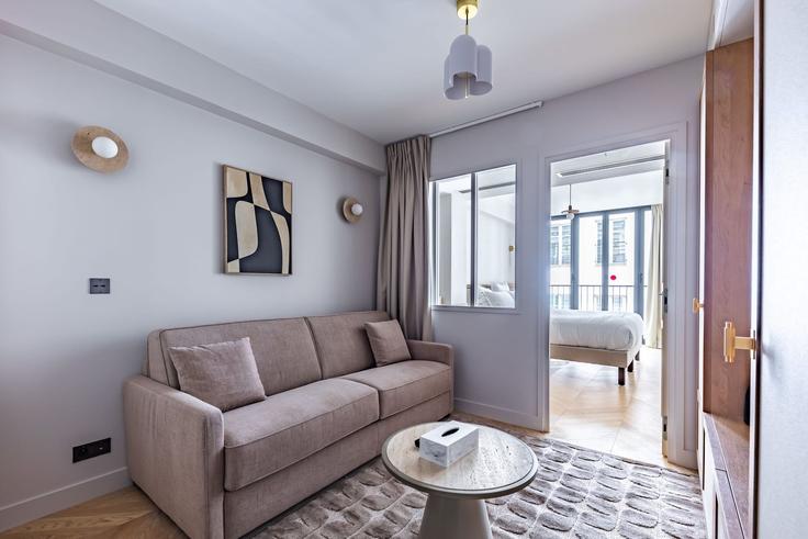 Elegantly designed living room with modern furnishings in an apartment at Building Rue de Caumartin - jhmh - 1471187 in 9th arrondissement, Paris
